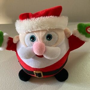 Plush Stuffed Spinning Musical Santa Claus Christmas Toy by Kids of America